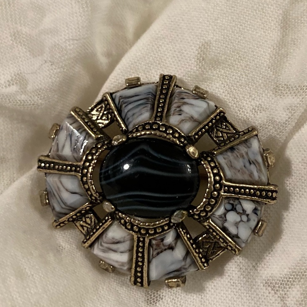Vintage black & white “Miracle branded” Celtic glass agate brooch pin.